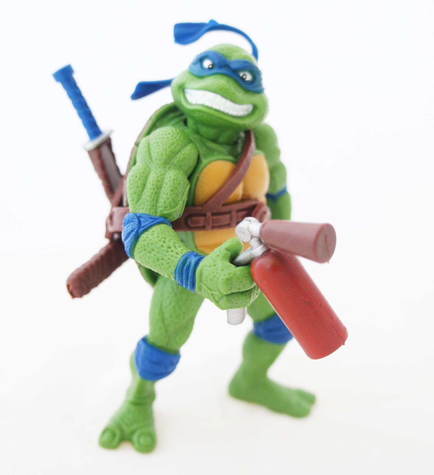 https://www.leftoverculturereview.com/wp-content/uploads/2014/10/Leonardo-TMNT-Movie-Stars-Playmates-Knock-Off-fire-extinguisher.jpg